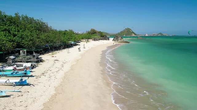Drone perspective of Kuta Lombok coastline showing beach and clear ocean waters
