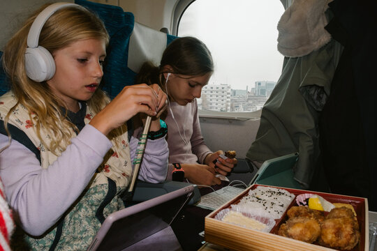 Kids in the train in Japan 