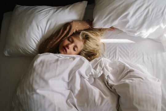 Sleeping girl in bed