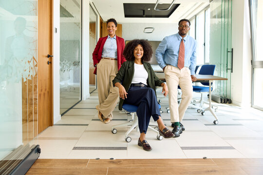 Businesspeople are in a modern office space