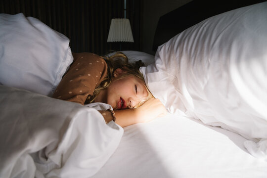 Sleeping girl in bed