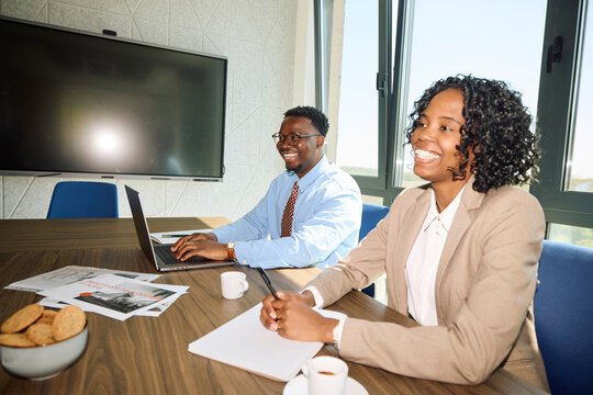 Man and woman engaged in a business meeting