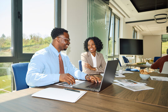 Joyful conversations taking place in the workplace