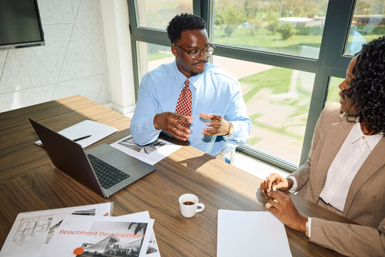 Business Meeting Held at a Modern Office