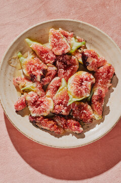 Slices of figs in stone plate