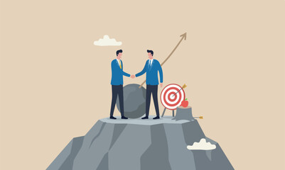 Trusted boulder uphill mountain peak or trust alliance concept, businessmen shaking hands agreement after finished danger risky apple shot archery show © Nazma