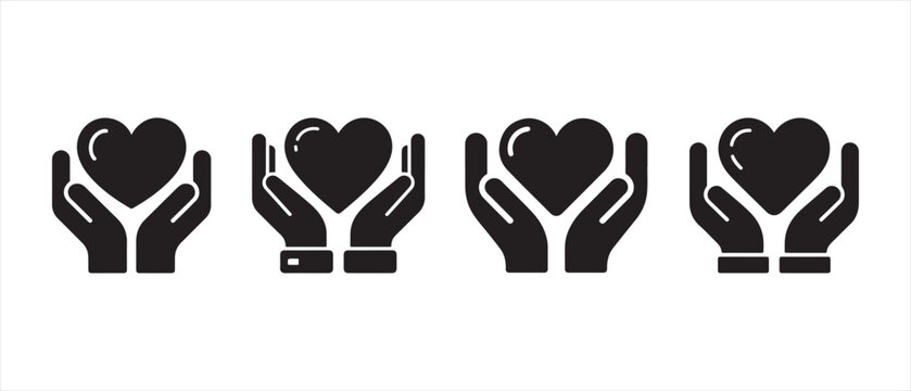 Black heart icons held in open human hands representing charity and care.