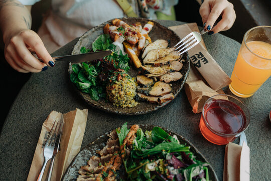 Healthy Restaurant Meal With Salads and Drinks