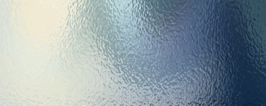 A close-up view of a textured surface, possibly frosted glass, with swirling patterns of blue and green.
