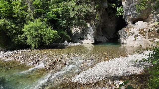 Resurgence of Sammaro River on a sunny summer day. Near Roscigno, in Cilento National Park, Campania, Italy