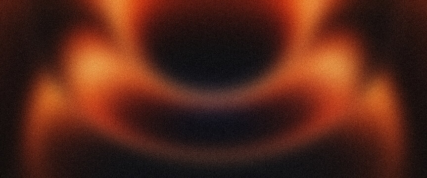 Abstract background with warm orange and dark brown glowing light flares on grainy surface creating dramatic intense atmospheric effect for creative graphic design.