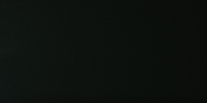 Deep black textured surface with subtle grain patterns