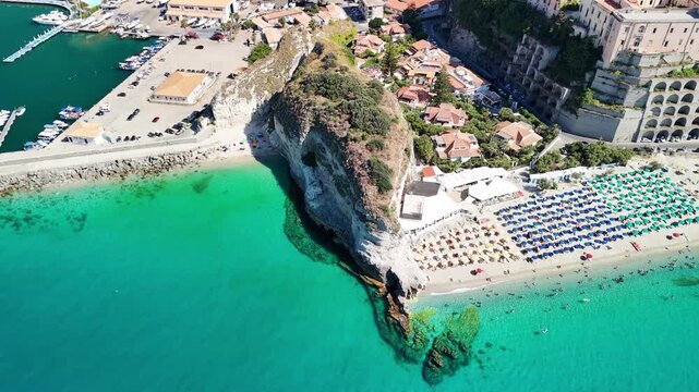 Drone perspective of Tropea in summer showing turquoise sea and scenic coastal landscape