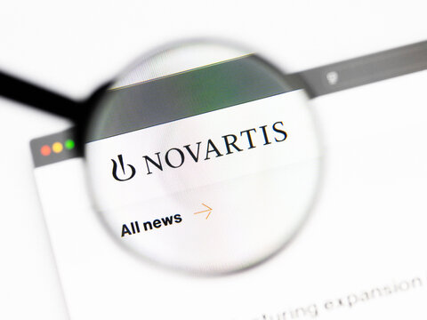 Milan, Italy 2026, 20 Apr Closeup of Novartis website on a laptop screen. Novartis logo under a magnifying glass.