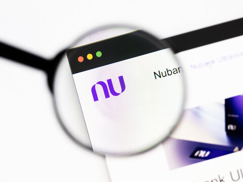 Milan, Italy 2026, 20 Apr Closeup of Nu Holdings website on a laptop screen. Nu Holdings logo under a magnifying glass.