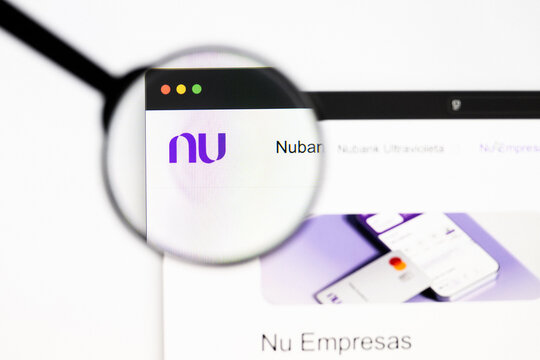 Milan, Italy 2026, 20 Apr Closeup of Nu Holdings website on a laptop screen. Nu Holdings logo under a magnifying glass.