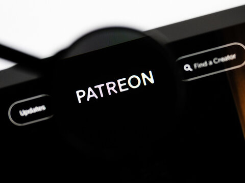Milan, Italy 2026, 20 Apr Closeup of patreon website on a laptop screen. patreon logo under a magnifying glass.