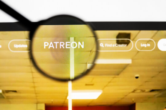 Milan, Italy 2026, 20 Apr Closeup of patreon website on a laptop screen. patreon logo under a magnifying glass.