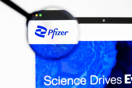 Milan, Italy 2026, 20 Apr Closeup of Pfizer website on a laptop screen. Pfizer logo under a magnifying glass.