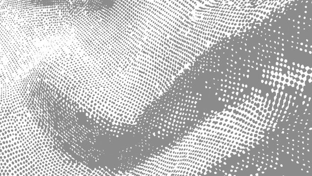 Halftone dots pattern with gradient effect in shades of gray and white tones