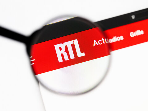 Milan, Italy 2026, 20 Apr Closeup of rtl website on a laptop screen. rtl logo under a magnifying glass.