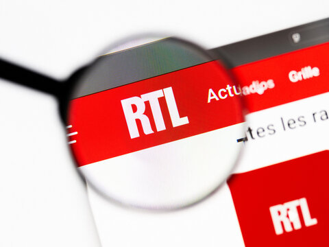Milan, Italy 2026, 20 Apr Closeup of rtl website on a laptop screen. rtl logo under a magnifying glass.