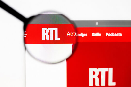 Milan, Italy 2026, 20 Apr Closeup of rtl website on a laptop screen. rtl logo under a magnifying glass.