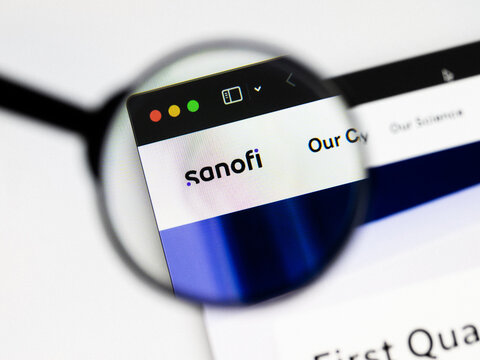 Milan, Italy 2026, 20 Apr Closeup of Sanofi website on a laptop screen. Sanofi logo under a magnifying glass.