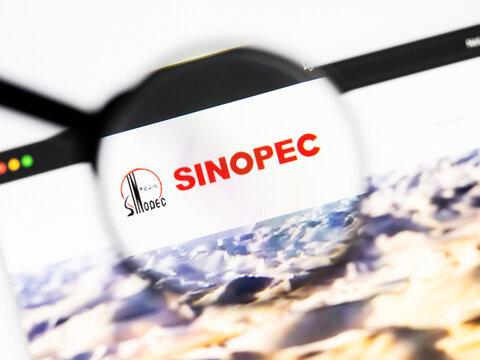 Milan, Italy 2026, 20 Apr Closeup of Sinopec website on a laptop screen. Sinopec logo under a magnifying glass.