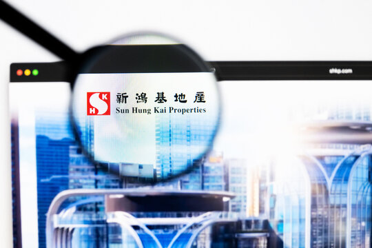 Milan, Italy 2026, 20 Apr Closeup of Sun Hung Kai Properties website on a laptop screen. Sun Hung Kai Properties logo under a magnifying glass.