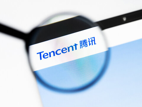 Milan, Italy 2026, 20 Apr Closeup of Tencent Holdings website on a laptop screen. Tencent Holdings logo under a magnifying glass.