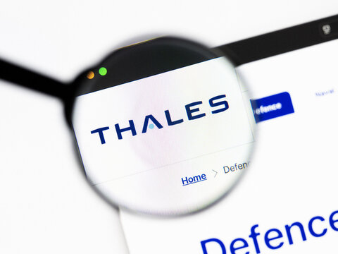 Milan, Italy 2026, 20 Apr Closeup of Thales website on a laptop screen. Thales logo under a magnifying glass.