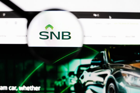 Milan, Italy 2026, 20 Apr Closeup of The Saudi National Bank SNB website on a laptop screen. The Saudi National Bank SNB logo under a magnifying glass.