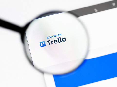 Milan, Italy 2026, 20 Apr Closeup of Trello website on a laptop screen. Trello logo under a magnifying glass.