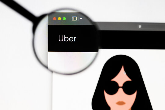 Milan, Italy 2026, 20 Apr Closeup of Uber website on a laptop screen. Uber logo under a magnifying glass.