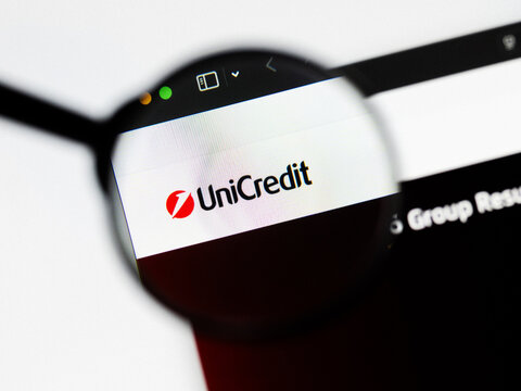 Milan, Italy 2026, 20 Apr Closeup of UniCredit website on a laptop screen. UniCredit logo under a magnifying glass.