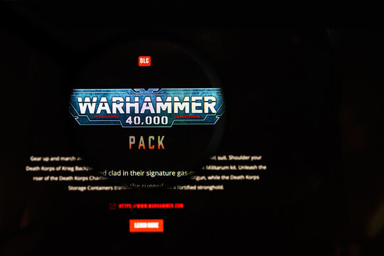 Milan, Italy 2026, 20 Apr Closeup of Warhammer 40000 website on a laptop screen. Warhammer 40000 logo under a magnifying glass.