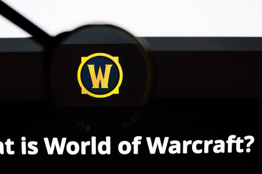 Milan, Italy 2026, 20 Apr Closeup of World of Warcraft website on a laptop screen. World of Warcraft logo under a magnifying glass.