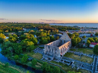 Naklejka premium Drone View of Pirita Convent Ruins in Tallinn Estonia at Sunset