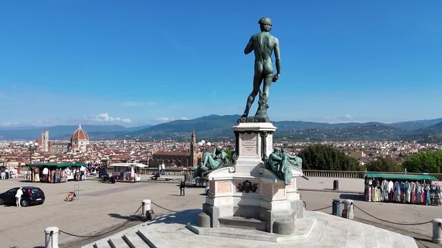 Drone perspective of David statue replica overlooking Florence from Piazzale Michelangelo