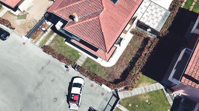 Drone shot of professional fumigation treatment in residential neighborhood green spaces