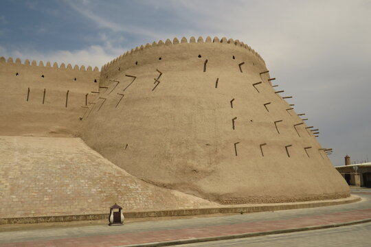 Historic defensive wall of Itchan Kala in the city of Khiva. Uzbekistan. Built with mud bricks and coated with a mixture of mud and straw. World Heritage Site.