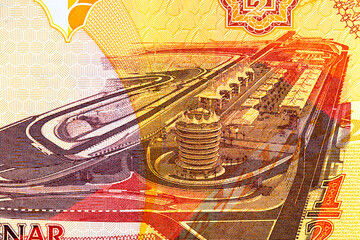 Obraz premium Bahraini half dinar banknote featuring the Bahrain International Formula One racetrack. Bahraini money.