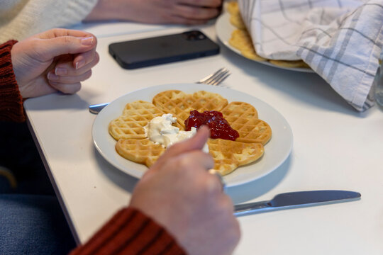 A beautiful, delicious home made norwegian waffles. A springtime scenery of Sunnmore region, More og Romsdale, Norway.