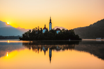 Fototapeta premium Bled, Slovenia. Bled Castle with Lake Bled with the Church of the Assumption of Maria and Julian Alps in the background