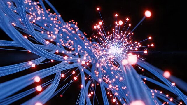 Abstract bundle of glowing blue fiber optic cables.