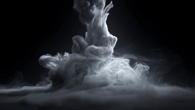 Swirling smoke explosion in slow motion creating dynamic cloud patterns