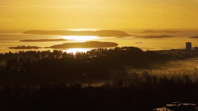 Cinematic Aerial View of Vast Fjord Archipelago and Ilands at Sunset