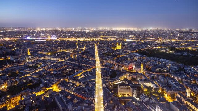 Time Lapse looking out over the city of Paris France at night.