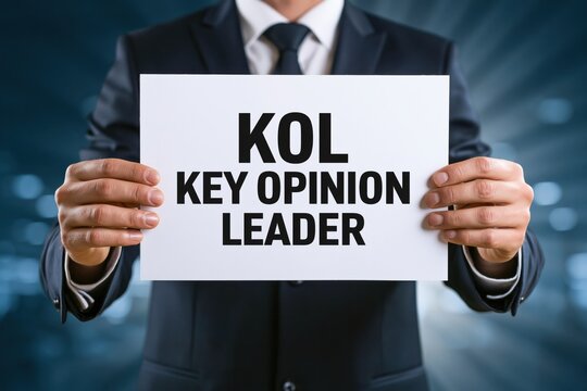 Business professional holding a white paper with kol key opinion leader